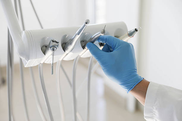 Professional Tooth Extraction technician working in New Franklin, MO